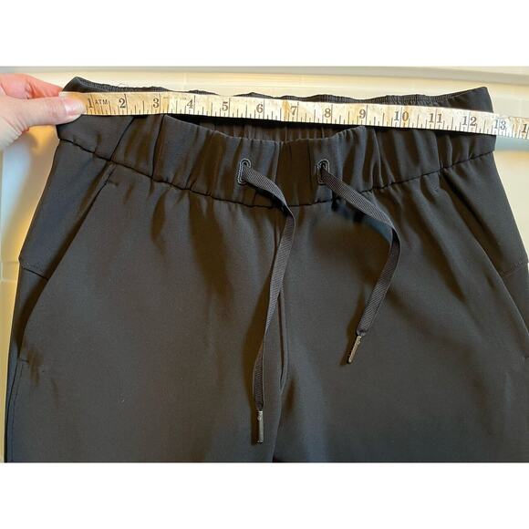 Lululemon On The Fly Pant 7/8 Women's Size 2 Black LW5BPMS 27" Inseam Pull On - Picture 9 of 11